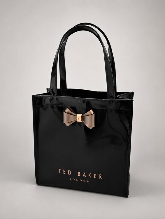 Ted Baker Handbags - Ted Baker Black Patent Vinyl Tote Bag with Metallic Bow Accent GUC